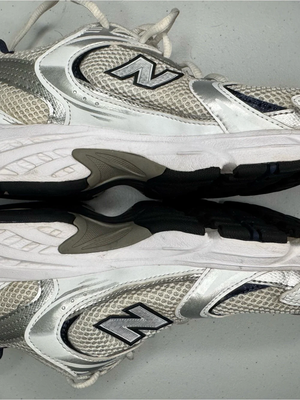 New Balance White and Silver Athletic Sneakers